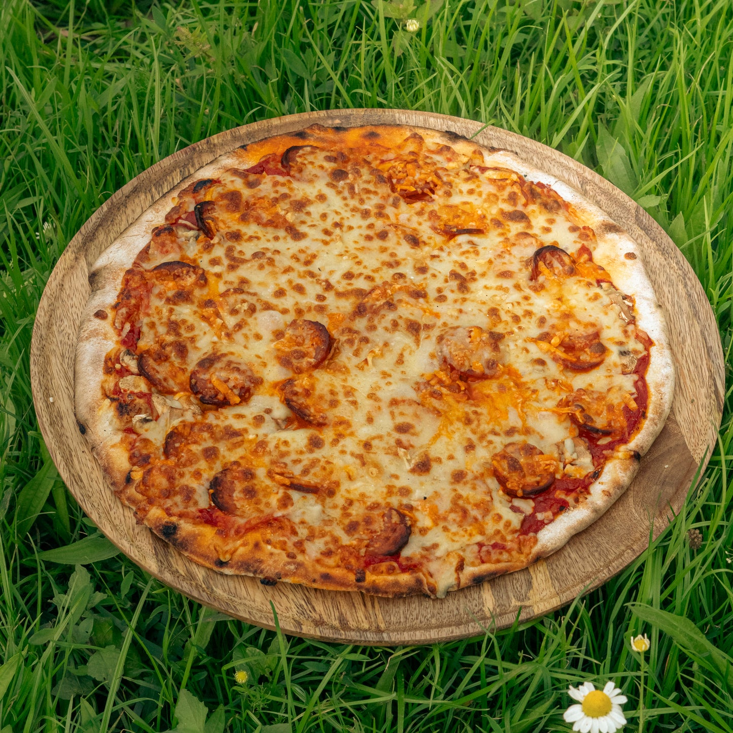 Pizza chorizo cuites au feu de bois