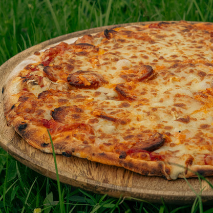 Pizza chorizo cuites au feu de bois