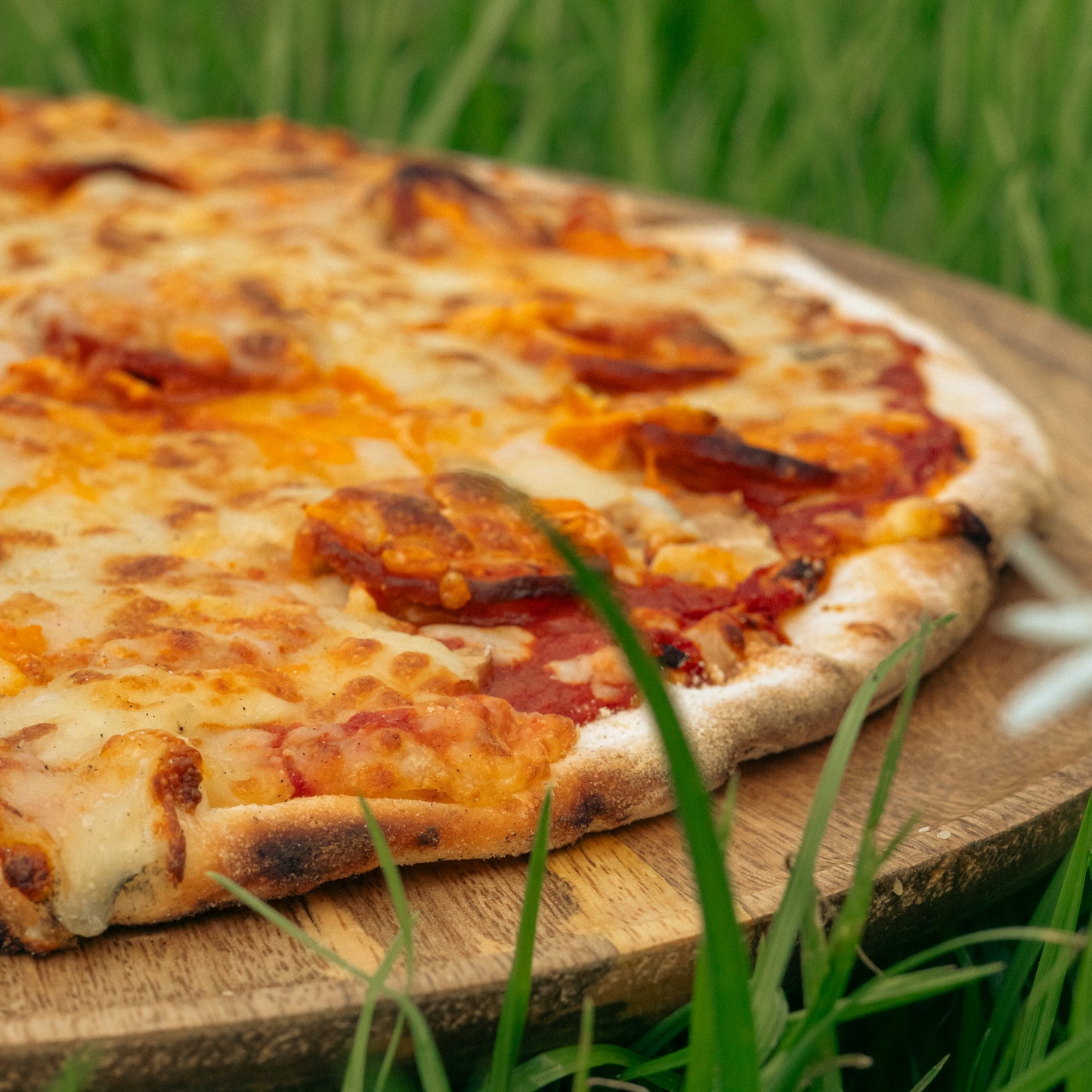 Pizza chorizo cuites au feu de bois
